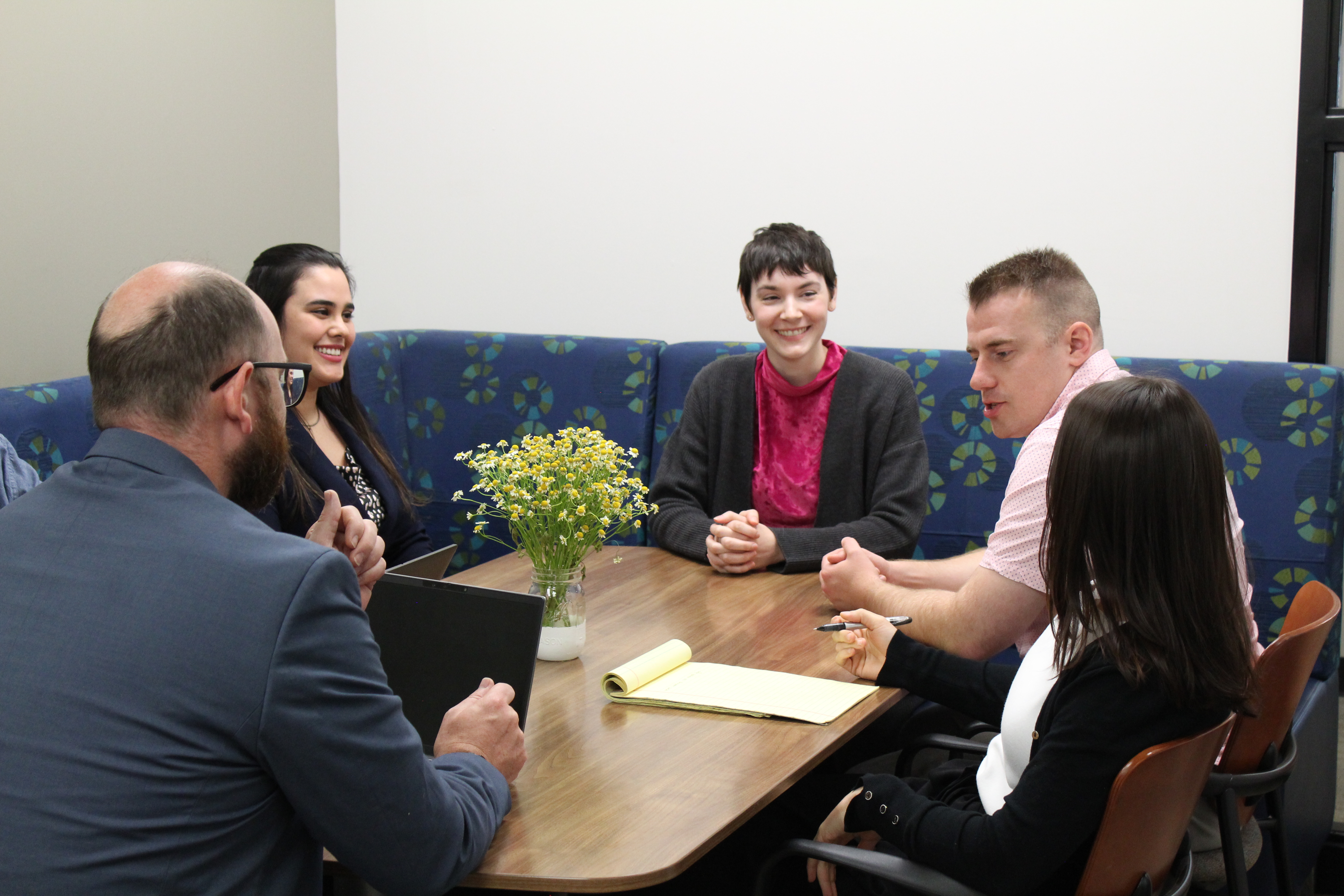 staff around table 1